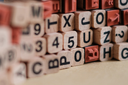 letters and numbers on wooden blocks / cubes - letterpressの写真素材