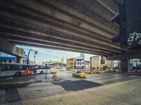 Car, bus and taxi traffic on crossroad street in Panama Cityのeditorial素材