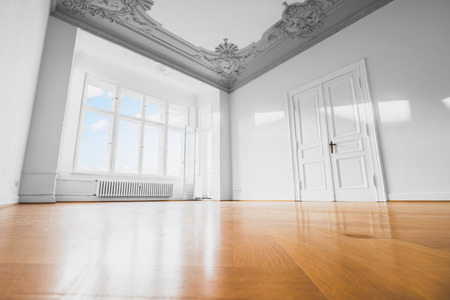 empty room after renovation - renovated apartment with wooden floorの写真素材