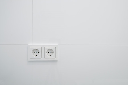 socket,  electric plug outlets on white tilesの写真素材