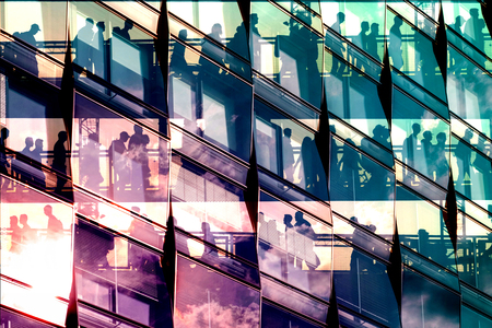 Business people success concept in office building glass facadeの写真素材