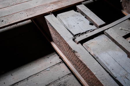 construction detail, metal and wood beam closeup in  attic / loft -  -