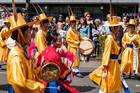 Korean people in traditional costumes on carnival of cultures (Carnival of Cultures) in Berlinのeditorial素材