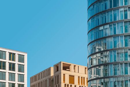 modern office buildings and blue sky copy space  - real estate concept -