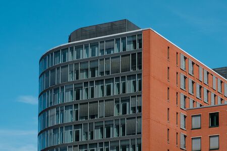 real estate exterior, modern building facade and blue sky -の写真素材