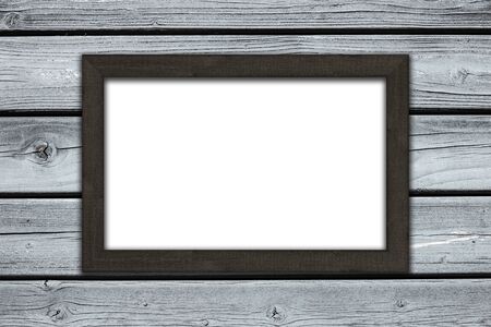 empty picture frame on wooden background - frame canvas on wallの写真素材