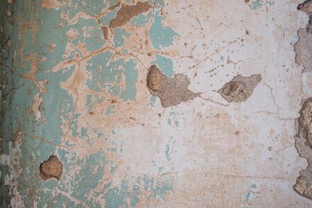 vintage wall background, damaged plaster stone wall textureの写真素材