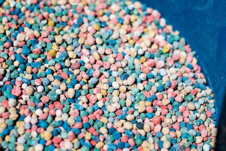 chemical felrtilizer closeup - colorful fertilizer granules -の写真素材