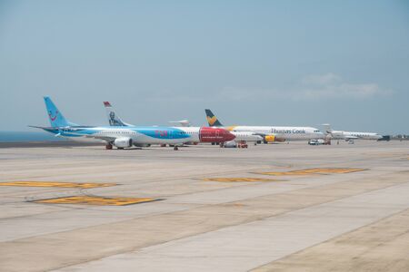 Airplanes of the Airline Company Thomas Cook Tui and Norwegian on the runway
