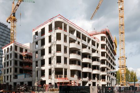 new apartment building under construction - real estate developmentの写真素材