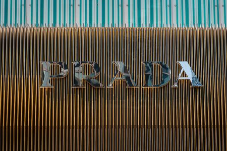 Hongkong - Noveber, 2019: Logo, signage, emblem of the brand Prada on shop facade