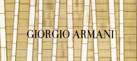 Hongkong - Noveber, 2019: Luxury designer brand logo of Giorgio Armani on shop exterior in shopping district in HongKong.のeditorial素材