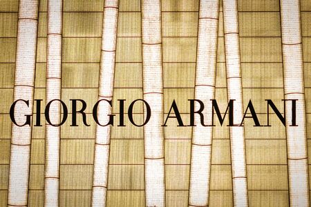 Hongkong - Noveber, 2019: Luxury designersignage logo of Giorgio Armani on Store facade in HongKong.のeditorial素材