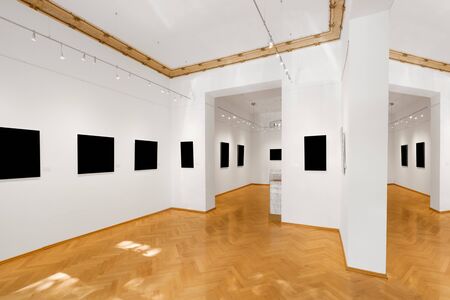 empty gallery room or showroom with blank picture frames, exhibition mock-upの写真素材