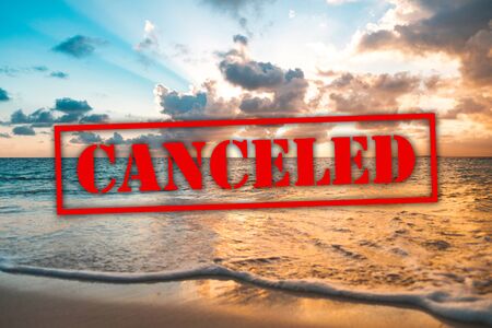 ocean, beach and sunset sky, vacation canceled due to corona virus, covid-19 conceptの写真素材