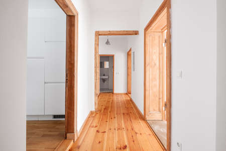 corridor in renovated, empty flat with wooden floor  -の写真素材