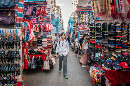 HongKong, China - November, 2019: Fashion, clothing and merchandise on street market (Ladie's Market) in Hong Kong, Tung Choi Streetのeditorial素材
