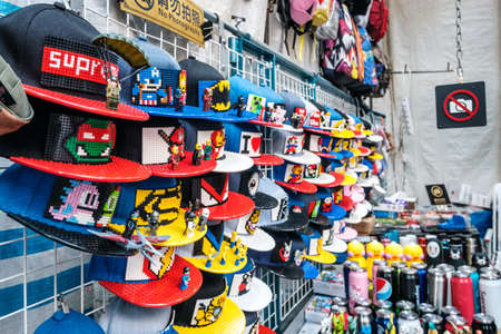 HongKong, China - November, 2019: Fashion, clothing and merchandise on street market (Ladie's Market) in Hong Kong, Tung Choi Streetのeditorial素材