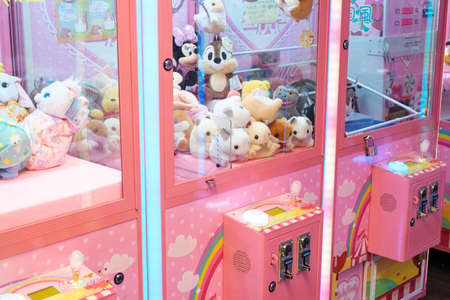 Hong Kong - November, 2019: Slot machine with crane to grab and win soft toysのeditorial素材