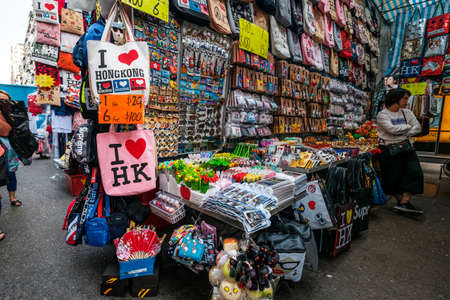 HongKong, China - November, 2019: Fashion, bags, clothing and merchandise on street market (Ladie's Market) in Hong Kong, Tung Choi Streetのeditorial素材