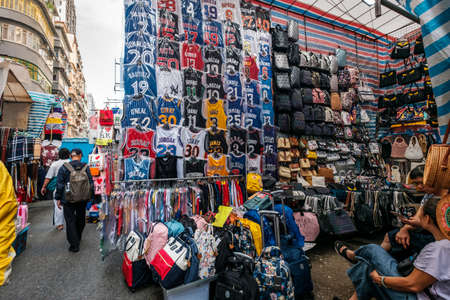 HongKong, China - November, 2019: Fashion, clothing and merchandise on street market (Ladie's Market) in Hong Kong, Tung Choi Streetのeditorial素材