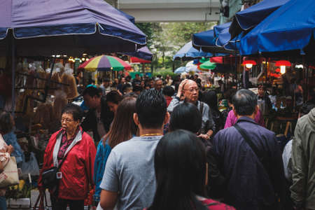 HongKong, China - November, 2019: People on crowded street food market in Hong Kongのeditorial素材