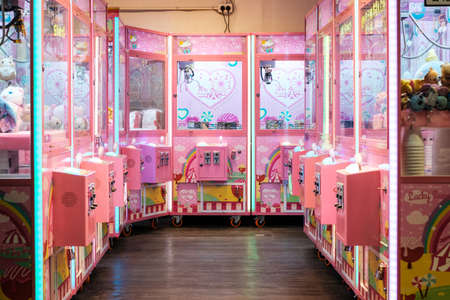 Hong Kong - November, 2019: Slot machine with crane to grab and win soft toysのeditorial素材