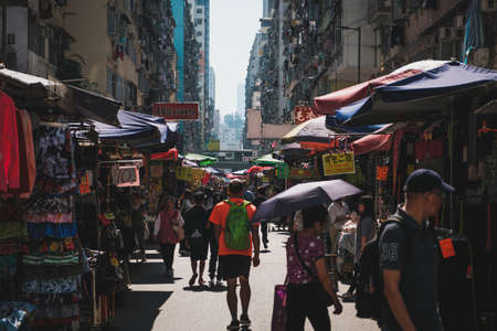 HongKong, China - November, 2019: People walking on street market in HongKong, MongKok