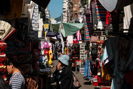 HongKong, China - November, 2019: Asian woman on street market (Ladie's Market) in Hong Kong, Tung Choi Streetのeditorial素材