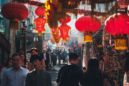 HongKong, China - November, 2019: People walking on street market in Soho, HongKong,