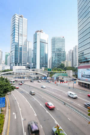 HongKong, China, November, 2019: Car, bus and taxi traffic on inner city highway in HongKong...