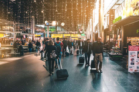 Amsterdam, Netherlands - November, 2019: People on airport (Schipol airport) in Amsterdamのeditorial素材