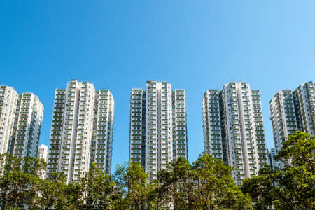 apartment buildings, residential real estate and blue sky copy space -の写真素材