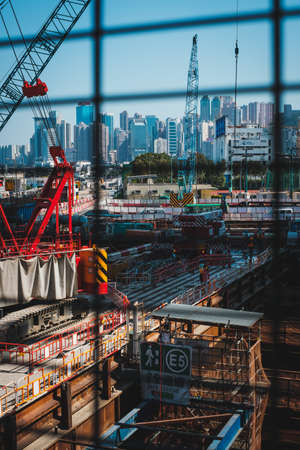 infrastructure construction site and city skyline background