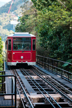 HongKong, China - November, 2019: The Peak Tram. The railway to Victoria Peak, a mountain with view above the city skyline of Hong Kongのeditorial素材