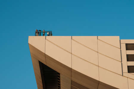 HongKong, China - November, 2019: People enjoying the skyline view of HongKong from The Peak Tower...