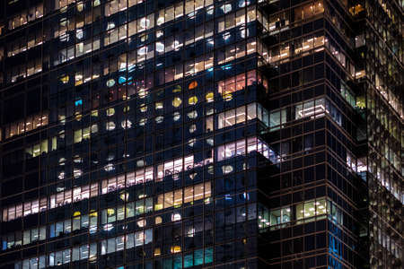office building facade at night - business districtの写真素材