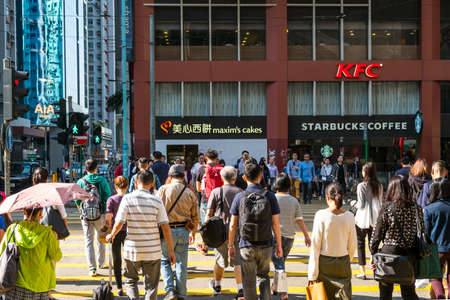 Hong Kong - November, 2019: Crowd of walking people crossing street in Hong Kongのeditorial素材
