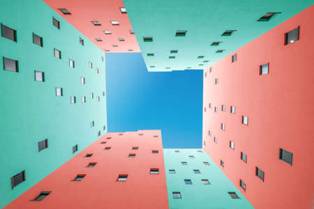 colorful building facade and blue sky - courtyardの写真素材