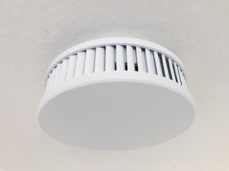 smoke detector on ceiling, fire alarm device -の写真素材