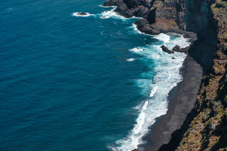 ocean waves, beach and shore - aerial view of coastal landscapeの写真素材
