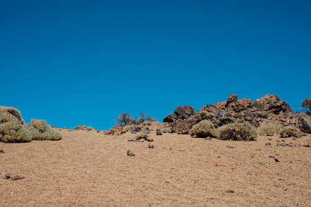 stones and sand, rock desert landscape with blue sky background .の写真素材