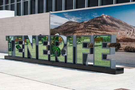 Tenerife, Spain - August, 2021: Tenerife Sign landmark with mount Teide poster background on Tenerife Airport South (TFS)のeditorial素材