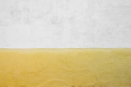 white, yellow wall background, concrete texture -の写真素材