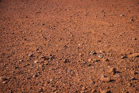 red sand and volcanic stones, Canary Island soil closeupの写真素材