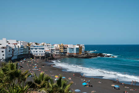 Tenerife, Spain - September, 2021: People at beach in Puerto de la Cruz, Tenerife, Canary Islandsのeditorial素材