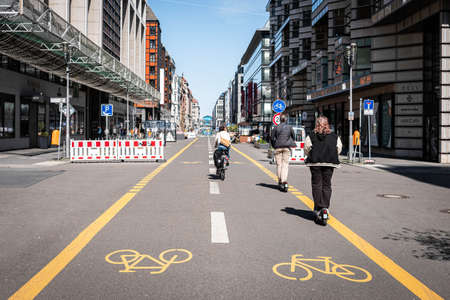 Berlin, Germany - April, 2022: People on Bicycle lane or pop-up bike lane in Berlin (Friedrichstrasse).のeditorial素材