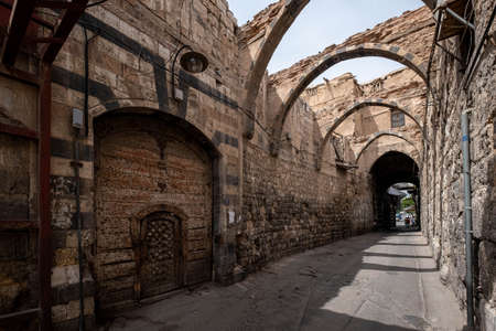 Historical oriental architecture in alley of old city of Damascusの写真素材