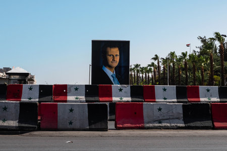 Damascus, Syria -May, 2022: Portrait image of Bashar al-Assad, President of Syria at checkpoint in Damascusのeditorial素材