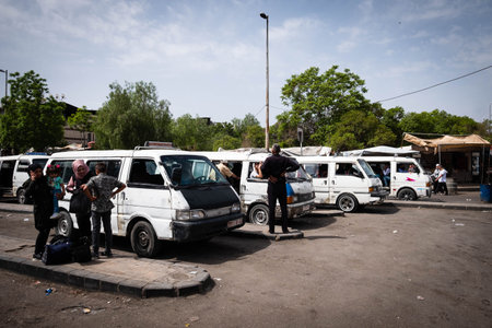Damascus, Syria -May, 2022: Many Minibuses on bus station in Damascusのeditorial素材